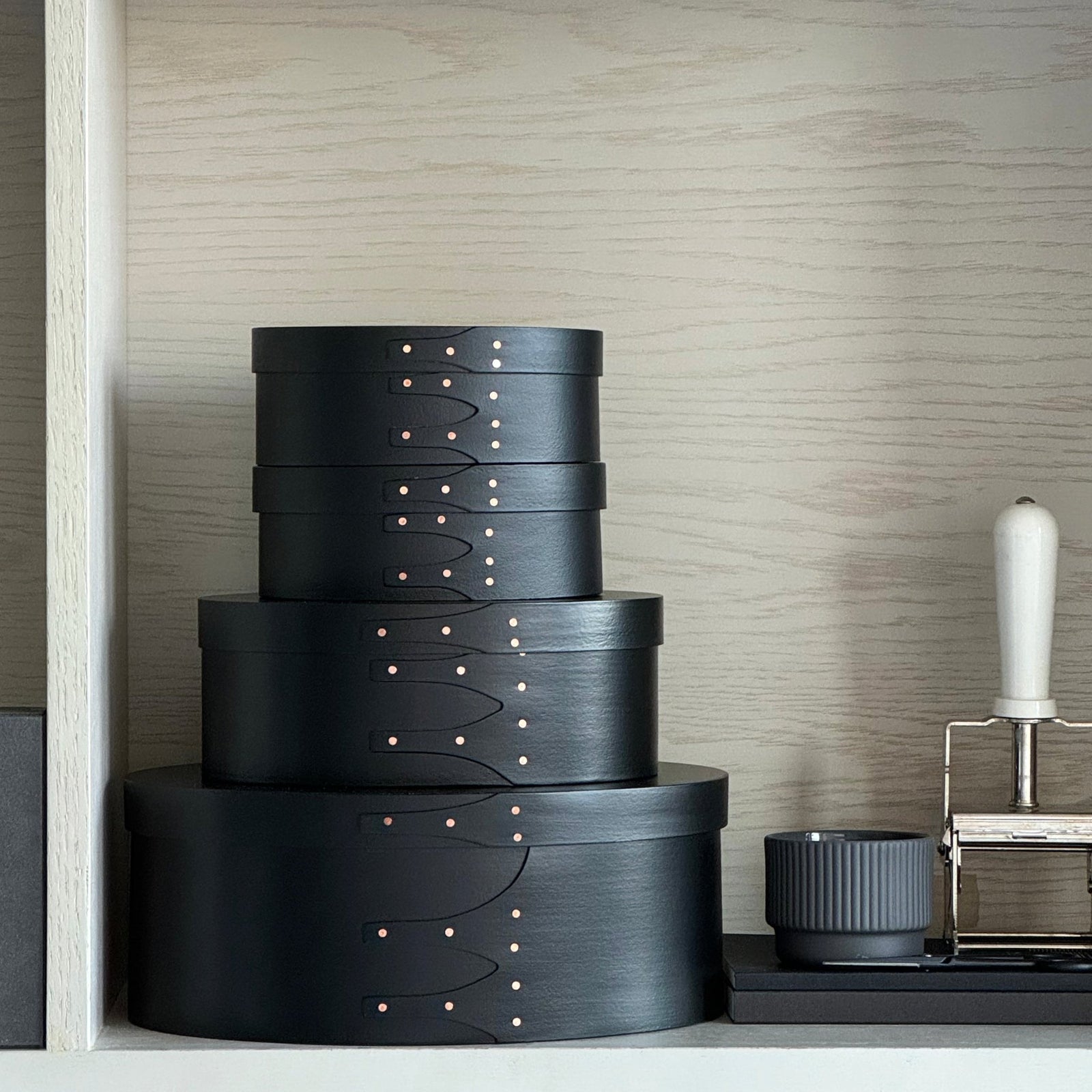 Blackshakerboxesstackonshelves