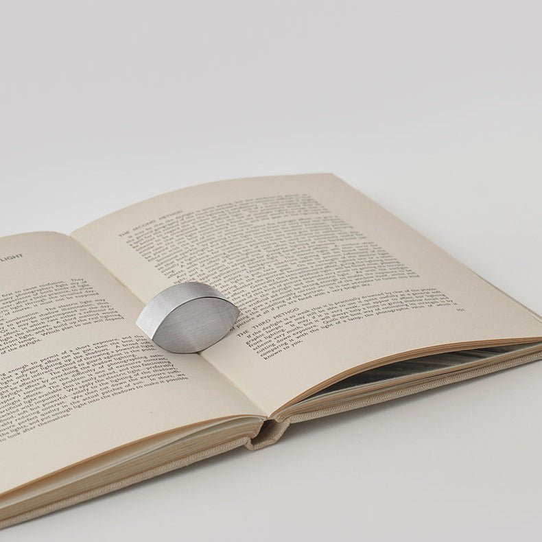 Signe Hytte Almond Book Weight: Stainless - Wms&Co.