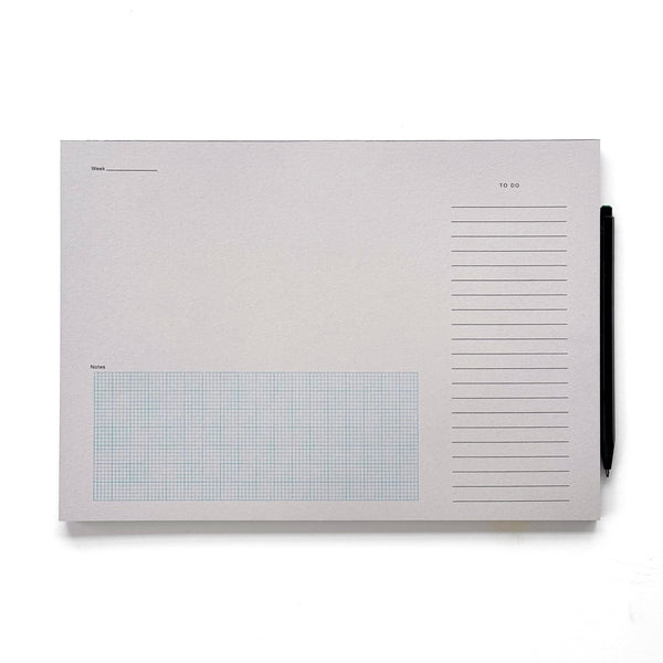 desktop notepad in grey. a simple minimal desk pad to organize your day. 