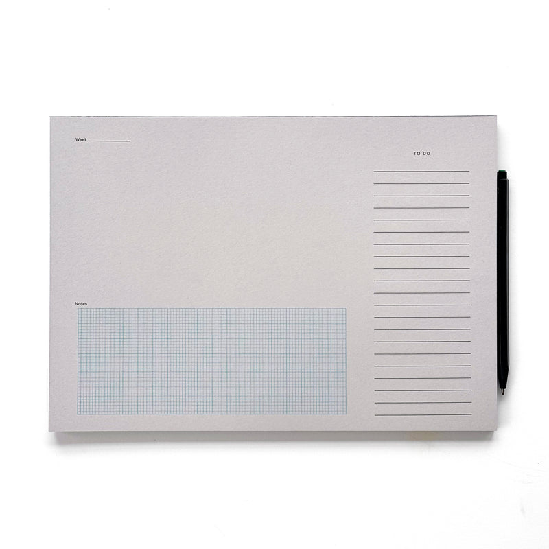 desktop notepad in grey. a simple minimal desk pad to organize your day. 